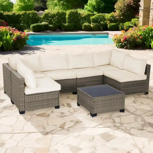 7-Piece All-Weather PE Wicker Patio Conversation Set with Beige Cushions and Coffee Table